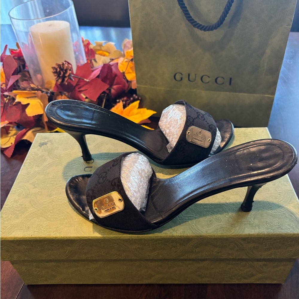 Gucci Black Heeled Mules with Gold Accents $275